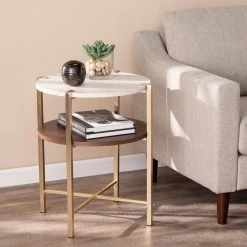 Ballia Brass and Dark Tobacco with White Faux Travertine Round End Table by Southern Enterprises