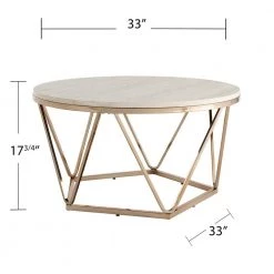 Ensla 33 in. Champagne/Faux Travertine Medium Round Stone Coffee Table by Southern Enterprises -Southern Enterprises Sales champagne and faux travertine finish southern enterprises coffee tables hd530963 4f 1000