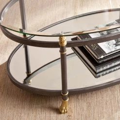 Dorothy 42 in. Dark Gray/Silver/Gold Large Oval Glass Coffee Table with Shelf by Southern Enterprises -Southern Enterprises Sales dark gray finish with silver distressing and gold accents southern enterprises coffee tables hd865003 c3 1000